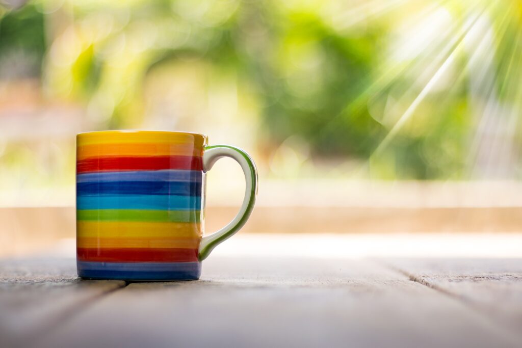 a colorful coffee mug